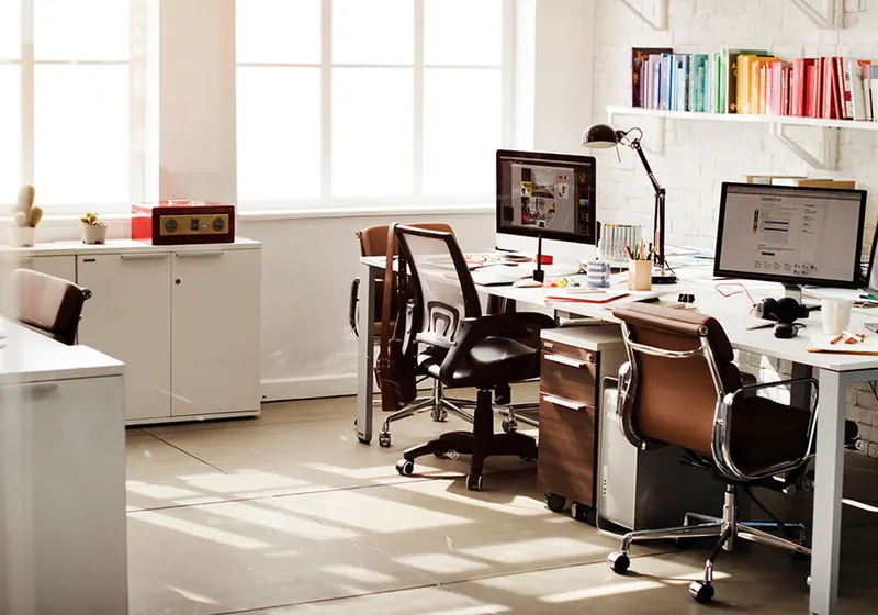 A bright, clean office workspace of the kind Berner Pest Solutions keeps pest free in Lexington KY